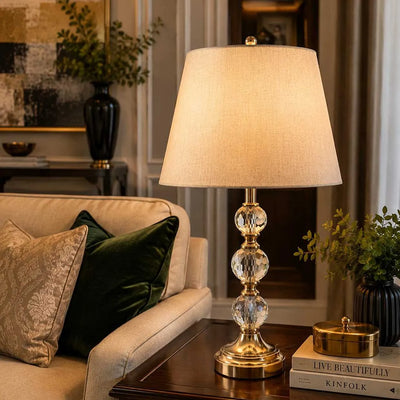 Lumière Crystal Globe Table Lamp – Antique Brass Finish with Linen Shade