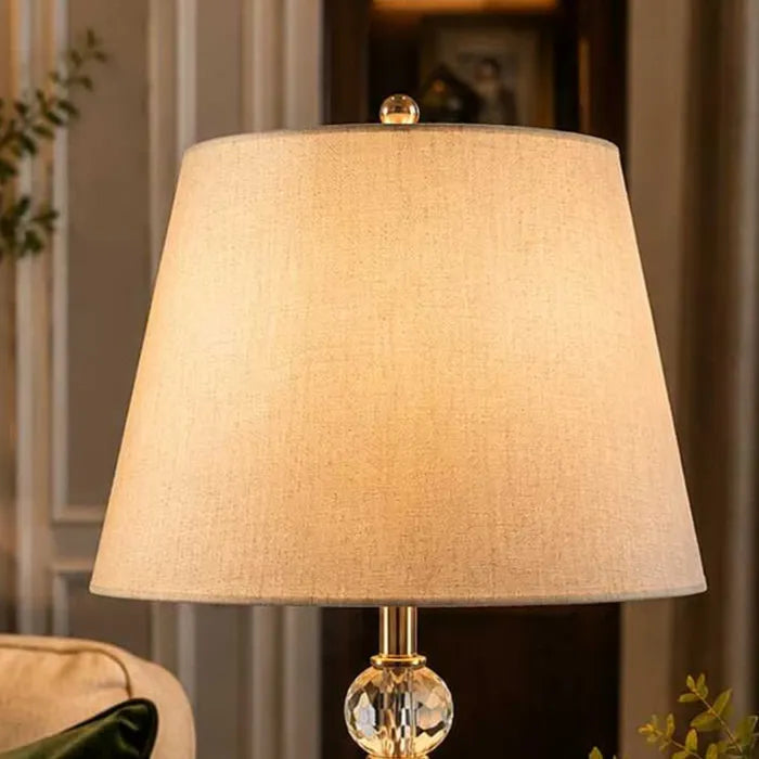 Lumière Crystal Globe Table Lamp – Antique Brass Finish with Linen Shade