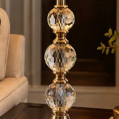 Lumière Crystal Globe Table Lamp – Antique Brass Finish with Linen Shade